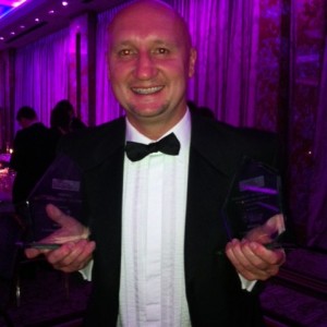 Wayne Cartwright of Communicate Better collects the award for Overall Reseller of the Year